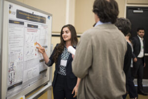 Student at research symposium