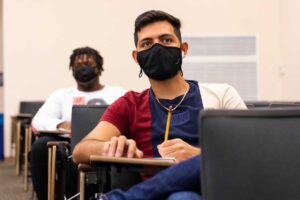 student wearing mask in classroom