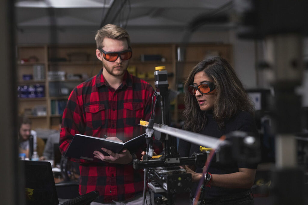 Seetha Raghavan and her student in lab